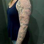 Mermaid with peonies tattoo sleeve