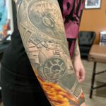 Tie fighter tattoo based on Star Wars